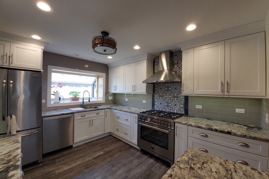 After: white shaker kitchen with subway tile