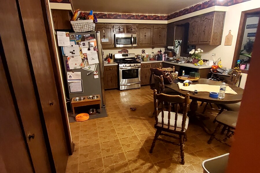 Before: cluttered galley kitchen
